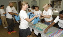 UCB vols assemble toiletries bags on HOA Day!
